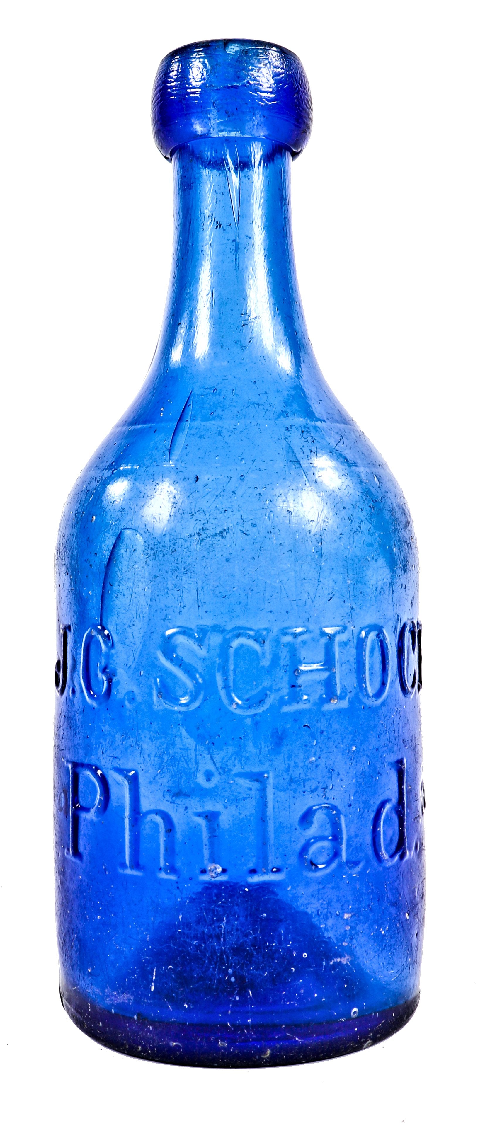 rare and all original intact privy dug antique american mid-nineteenth century vibrant cobalt blue glass cylindrical iron pontiled soda bottle manufactured for j. george schoch in philadelphia, pa.