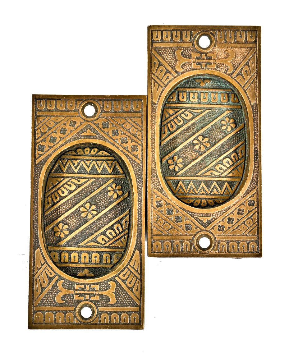 two matching 19th century original interior residential cast brass "ceylon" pattern sliding or pocket door backplates with deeply recessed "cup" handles