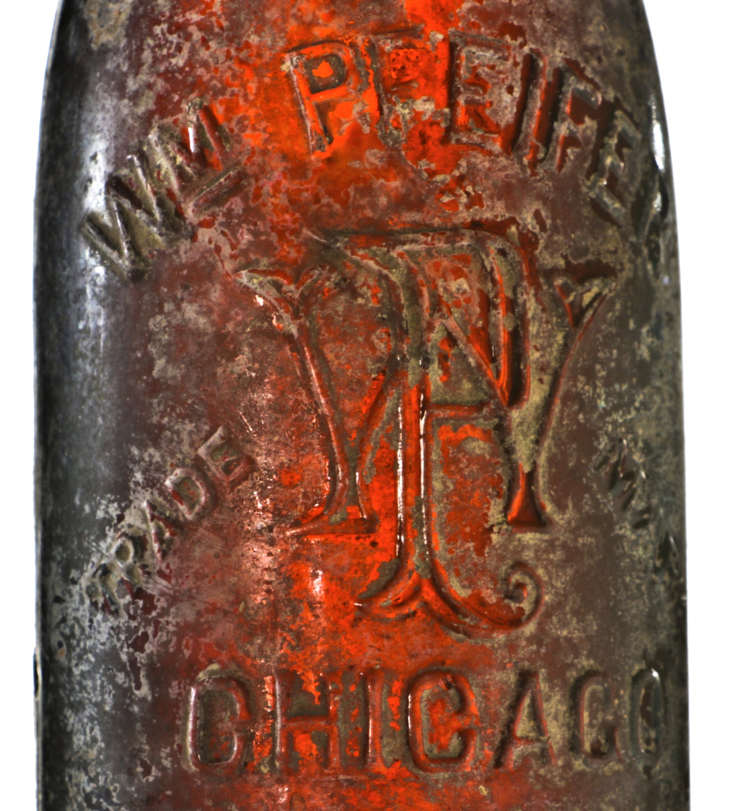 hard to find intact and original late nineteenth century reddish amber glass st. louis weiss style bottle manufactured for chicago bottler william pfeifer