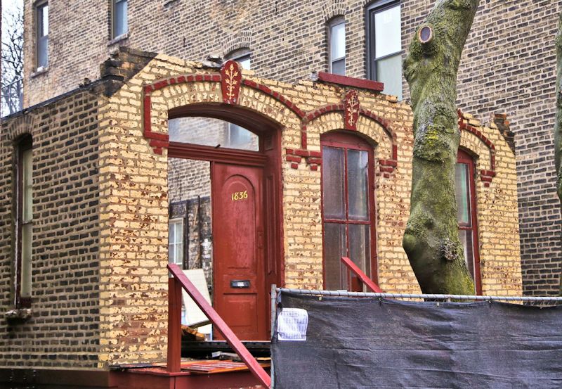 matching set of original 1870's post-fire chicago cottage painted pine wood entrance doors with archtop panels