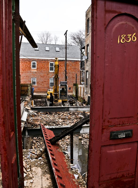matching set of original 1870's post-fire chicago cottage painted pine wood entrance doors with archtop panels