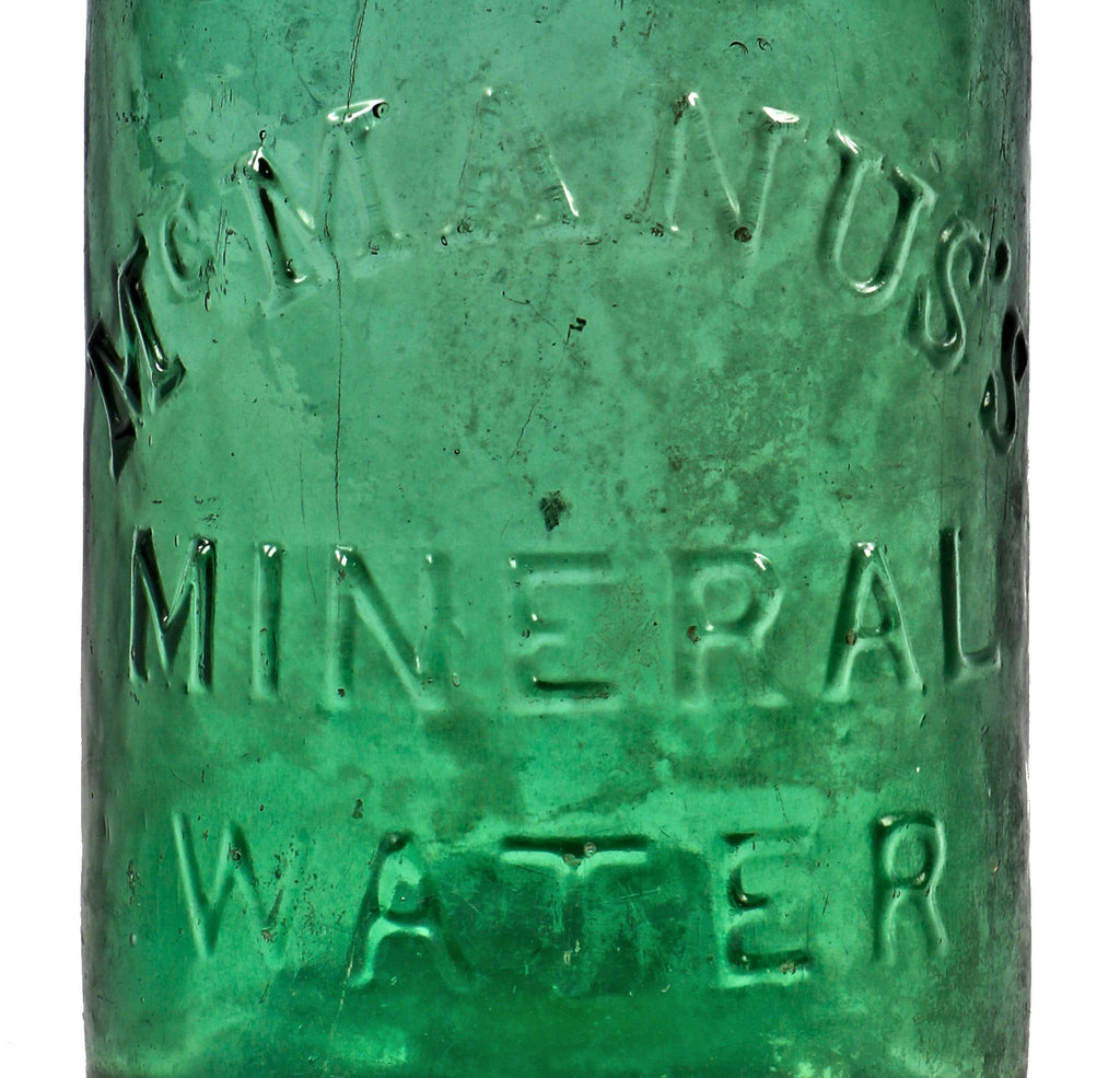 very rare original and largely intact mid-1840's american "mcmanus's mineral water" early soda bottle with heavy whittling and open-pontiled base