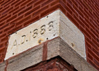 rare and all original late nineteenth century collection of artifacts including cornerstone with time capsule and contents salvaged from a non-extant evangelical church in west chicago