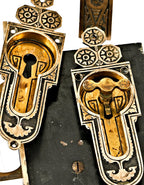 original late 1870's finely executed ornamental cast bronze chicago residential salvaged interior pocket door hardware with fully functional mortise locks and original key