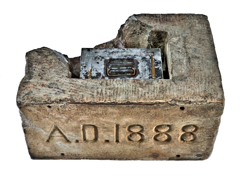 rare and all original late nineteenth century collection of artifacts including cornerstone with time capsule and contents salvaged from a non-extant evangelical church in west chicago