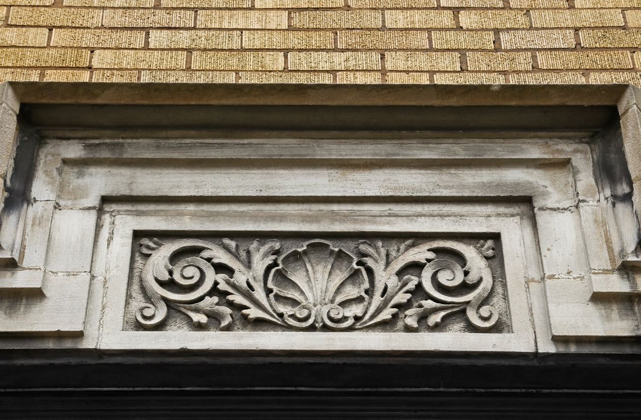 early 20th century original heavily carved antique american ornamental salvaged chicago bedford limestone exterior wrigleyville apartment building facade plaque with age appropriate wear