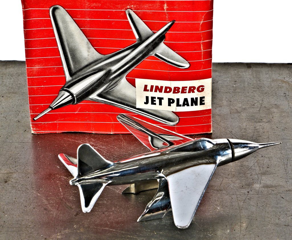 all original and perfectly intact c. 1950's super streamlined automotive or hardware store new old stock "lindberg jet plane" chrome-plated car hood ornament