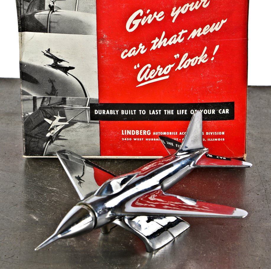 all original and perfectly intact c. 1950's super streamlined automotive or hardware store new old stock "lindberg jet plane" chrome-plated car hood ornament