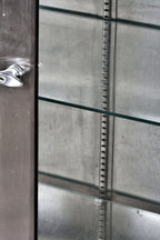 highly sought after all original and well-maintained c. 1950's cook county hospital stainless steel oversized medical cabinet with intact plate glass shelves and steel brackets