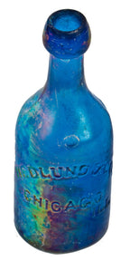 original antique american mid-nineteenth century irridized cobalt blue glass iron-pontiled soda bottle fabricated for john hedlund & company in chicago, ills.