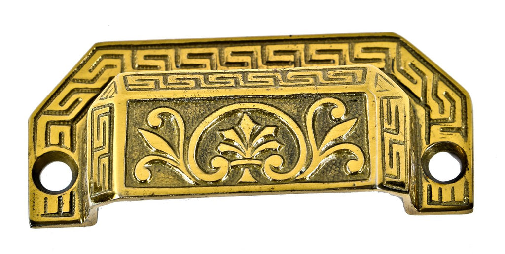 group of original 19th century ornamental cast brass interior residential pantry cabinet drawer pulls with distinctive neo-grec border and centrally located palmettes