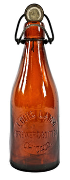 all original and intact c.1890's blobtop amber glass weiss beer bottle with original lightning closure manufactured for chicago bottler louis lamm