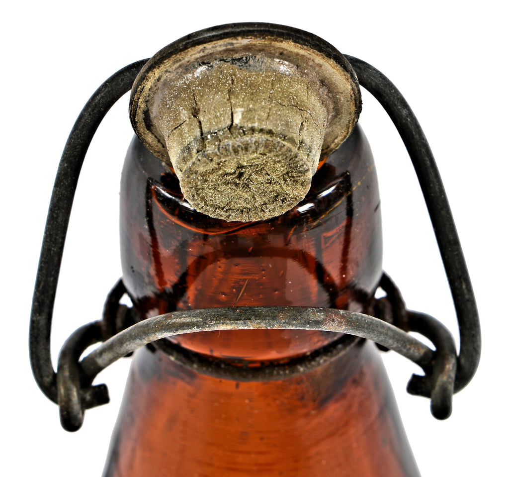 all original and intact c.1890's blobtop amber glass weiss beer bottle with original lightning closure manufactured for chicago bottler louis lamm