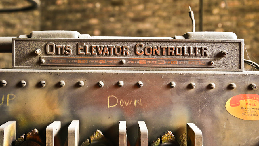 original early 20th century single-sided american industrial angled back crane brothers building otis elevator "controller" upright motor plaque with copper-plated finish