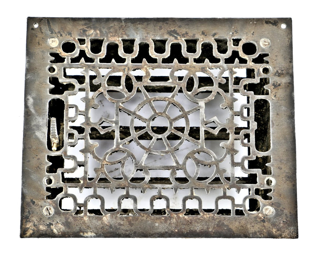all original late 1870's antique american fully functional louvered ornamental cast iron floor or wall flush mount register with thumb handle and pivoting louvers