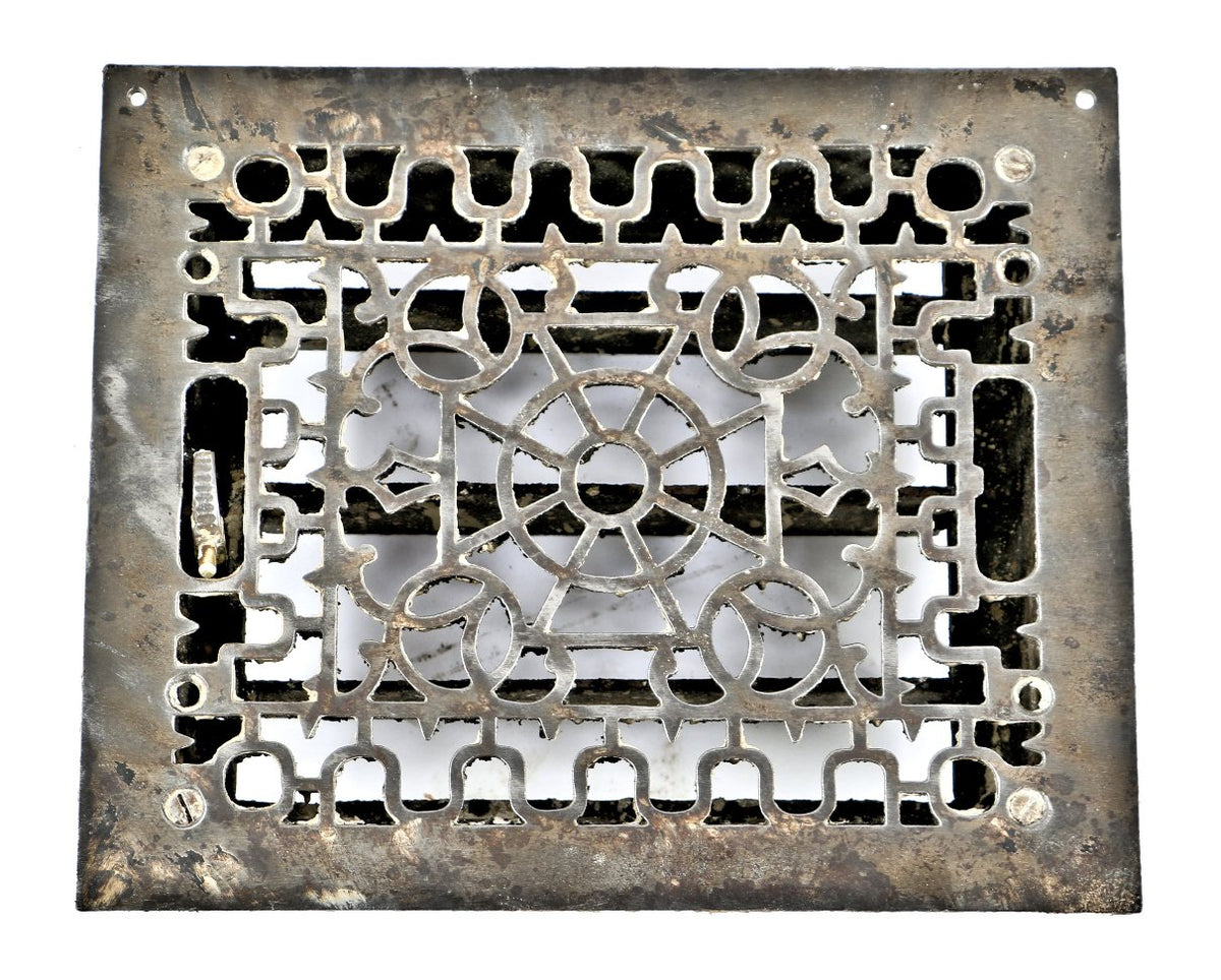 all original late 1870's antique american fully functional louvered ornamental cast iron floor or wall flush mount register with thumb handle and pivoting louvers