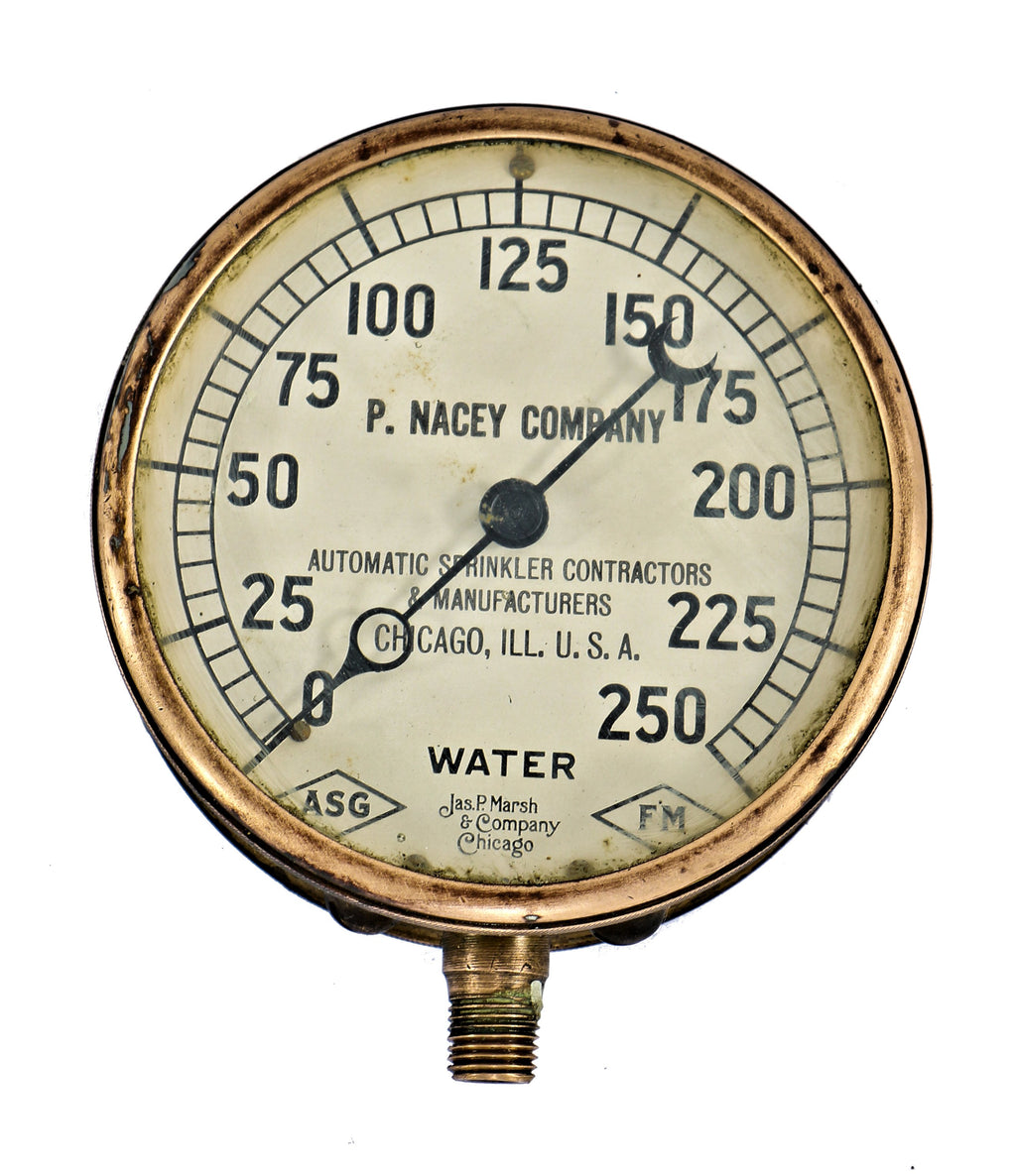 single lightly refinished antique american early 20th century crane brothers factory steam pressure gauge designed and fabricated for the p. nacey company in chicago, il.