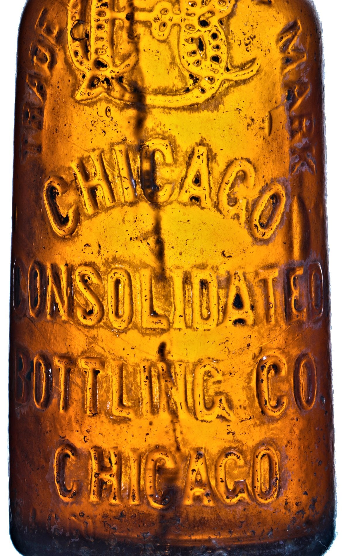 hard to find late nineteenth century privy dug and intact amber blobtop bottle fabricated for the chicago consolidated bottling company