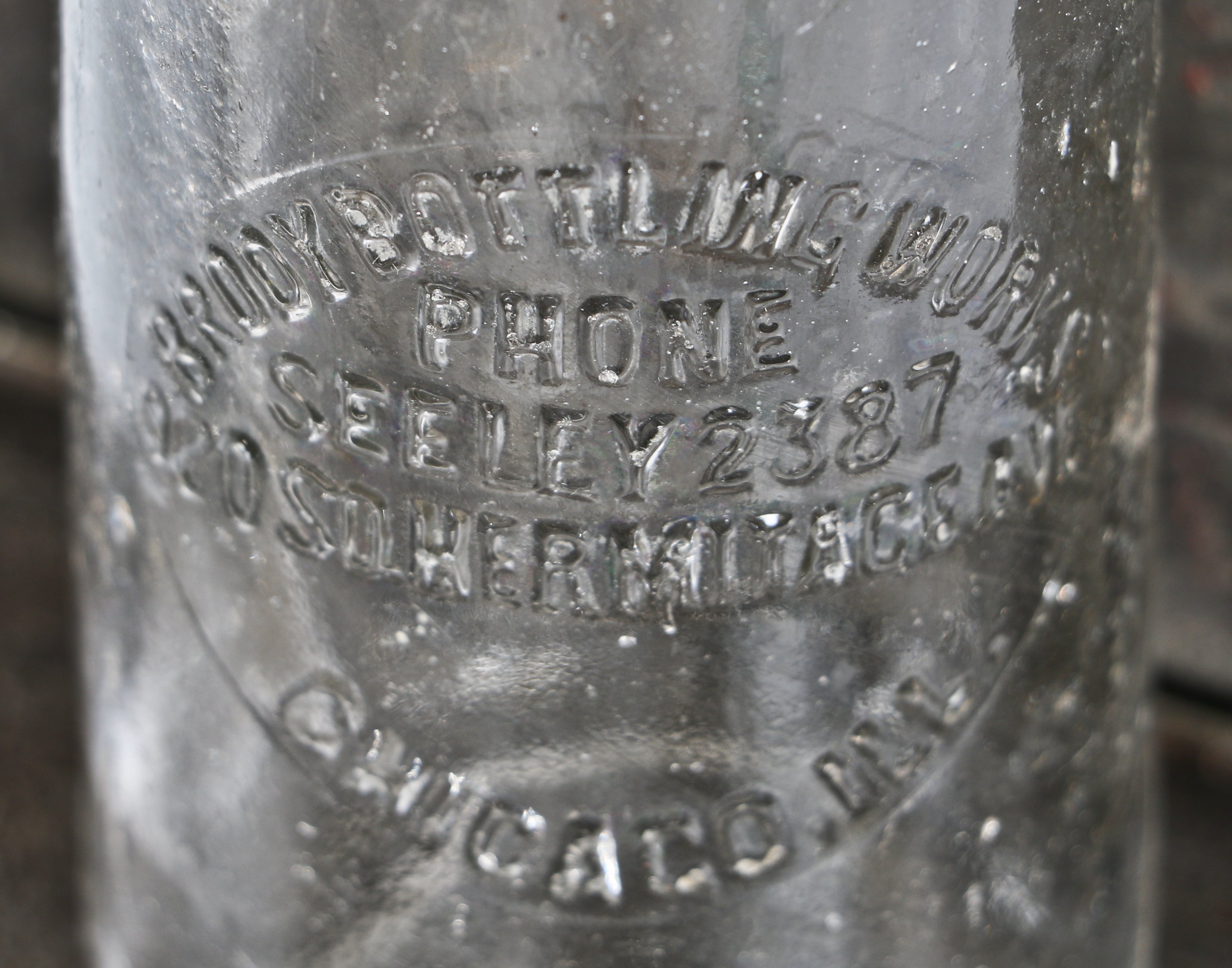 rare and all original antique american early twentieth century colorless glass hutchinson style beer or mineral water bottle fabricated for brody bottling works.