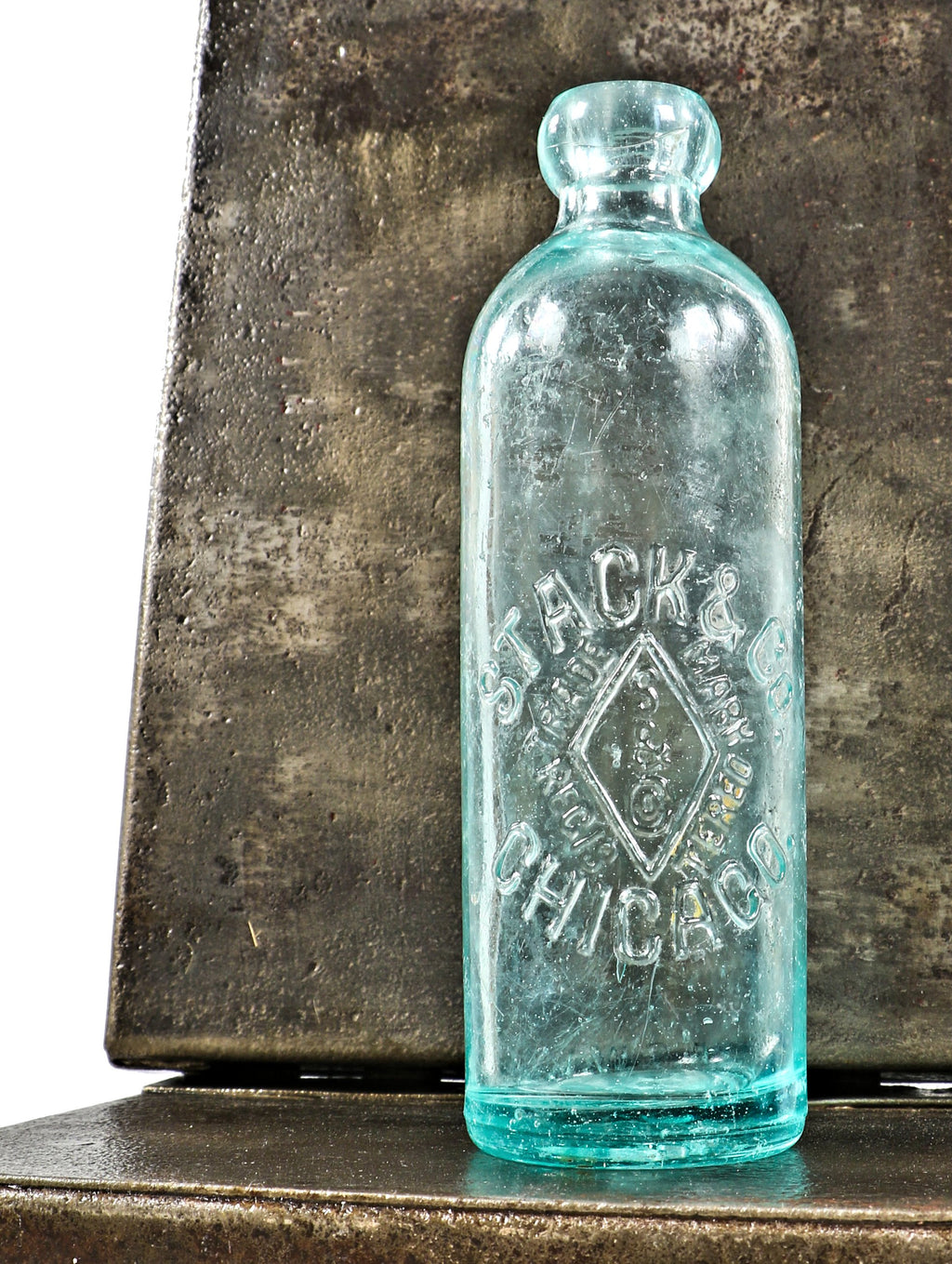 single hard to find and intact american industrial antique c. 1880-1905 privy dug aqua glass hutchinson blobtop manufactured in pittsburgh for chicago bottler stack & company.