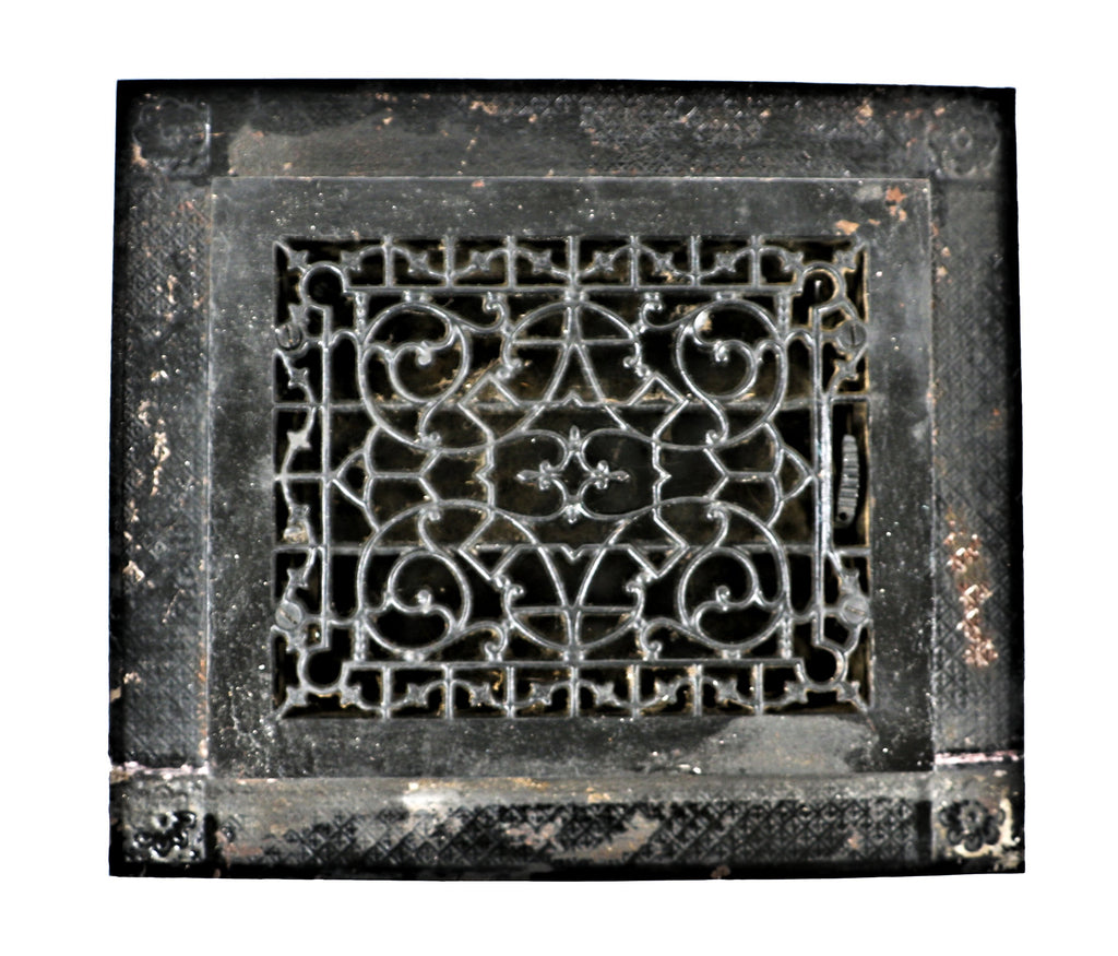 one of several original 19th century salvaged chicago ornamental cast iron fully functional floor registers with matching iron surround and black enameled finish
