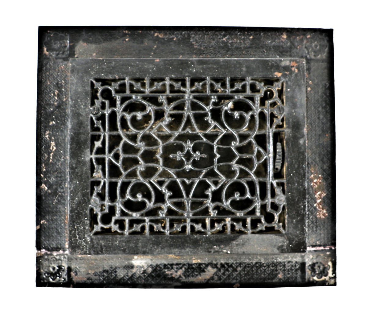 one of several original 19th century salvaged chicago ornamental cast iron fully functional floor registers with matching iron surround and black enameled finish