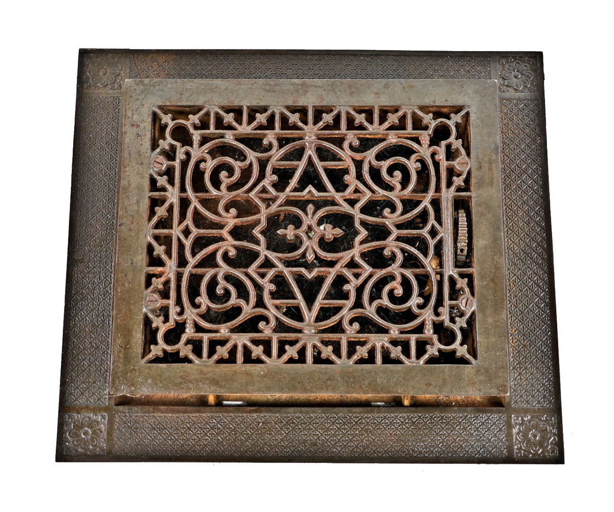 single original and intact late 19th or early 20th century antique american ornamental cast iron residential salvaged chicago floor grate with surround