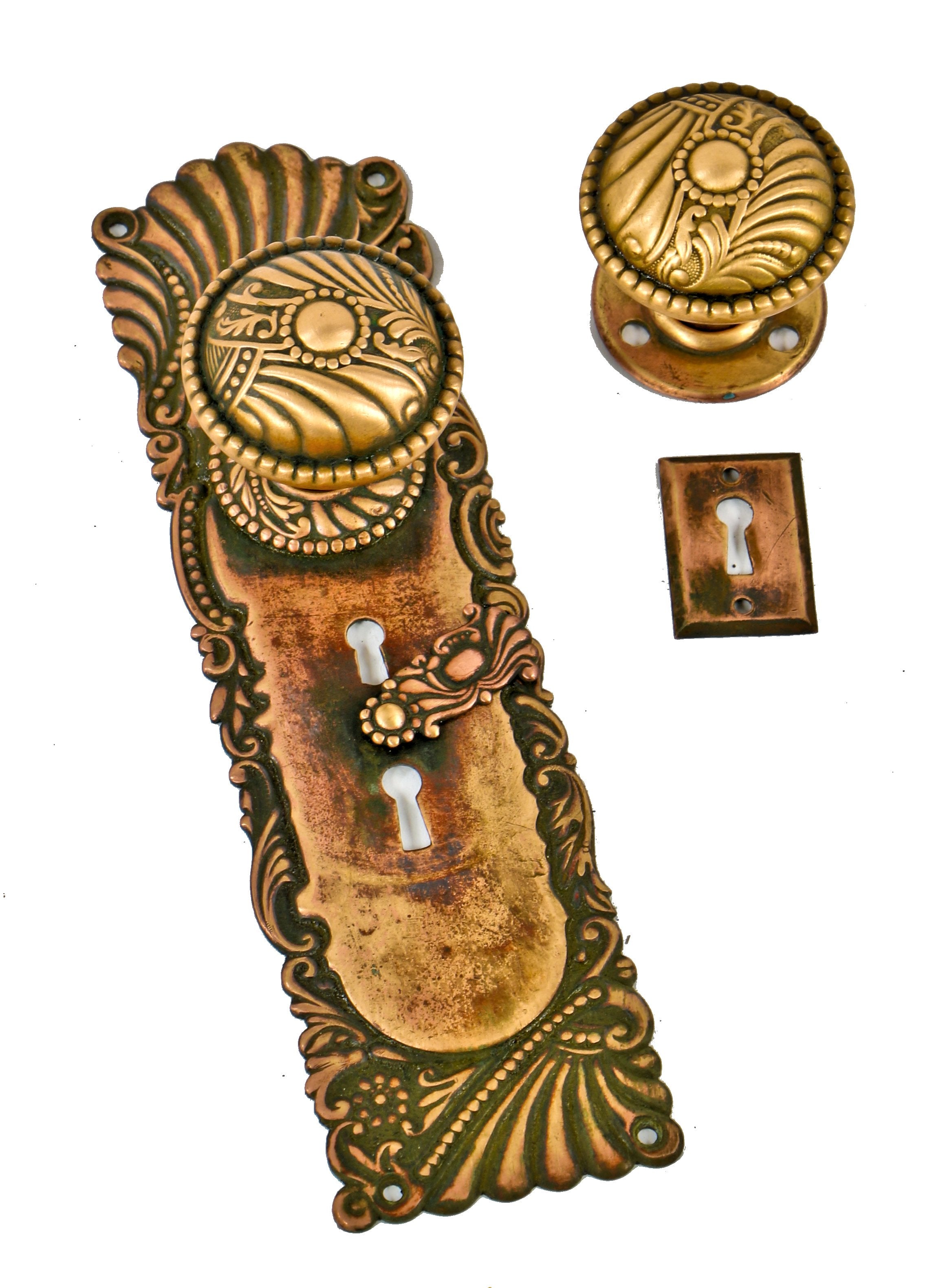 original late 19th century antique american ornamental stamped brass "roanoke" pattern salvaged chicago entrance door hardware with nicely aged patina