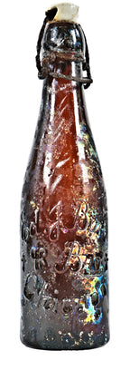 original hard to find late nineteenth century amber st. louis weiss shaped beer bottle manufactured for chicago brewers edward j. birk & brothers
