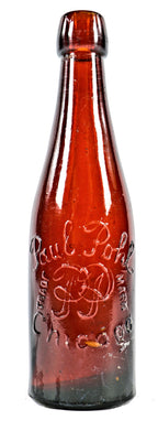 single original and completely intact late nineteenth century reddish amber glass weiss beer bottle manufactured for paul pohl in chicago, il.