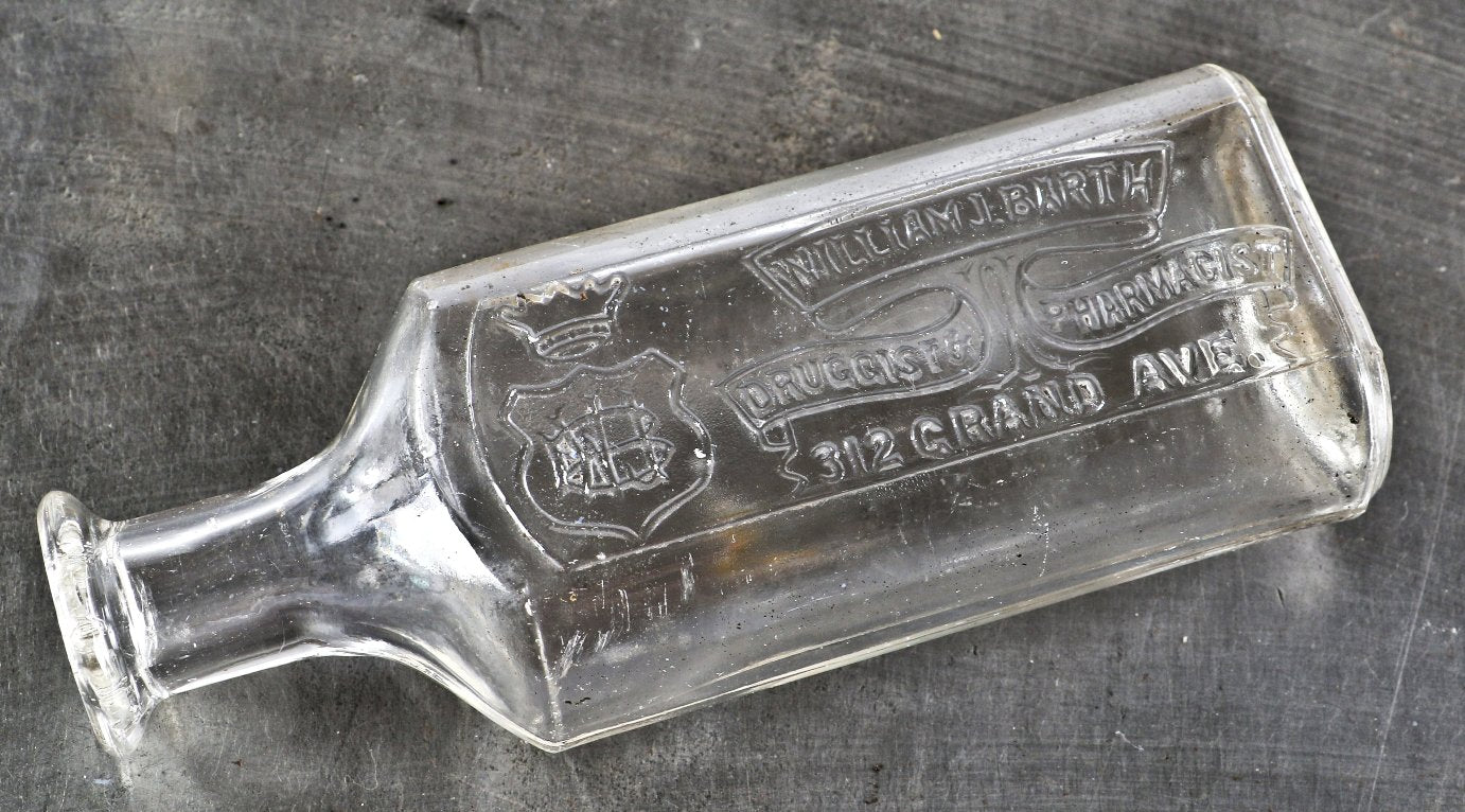 original and intact late nineteenth century privy dug hand blown colorless glass medicine bottle fabricated for chicago pharmacist william j. barth