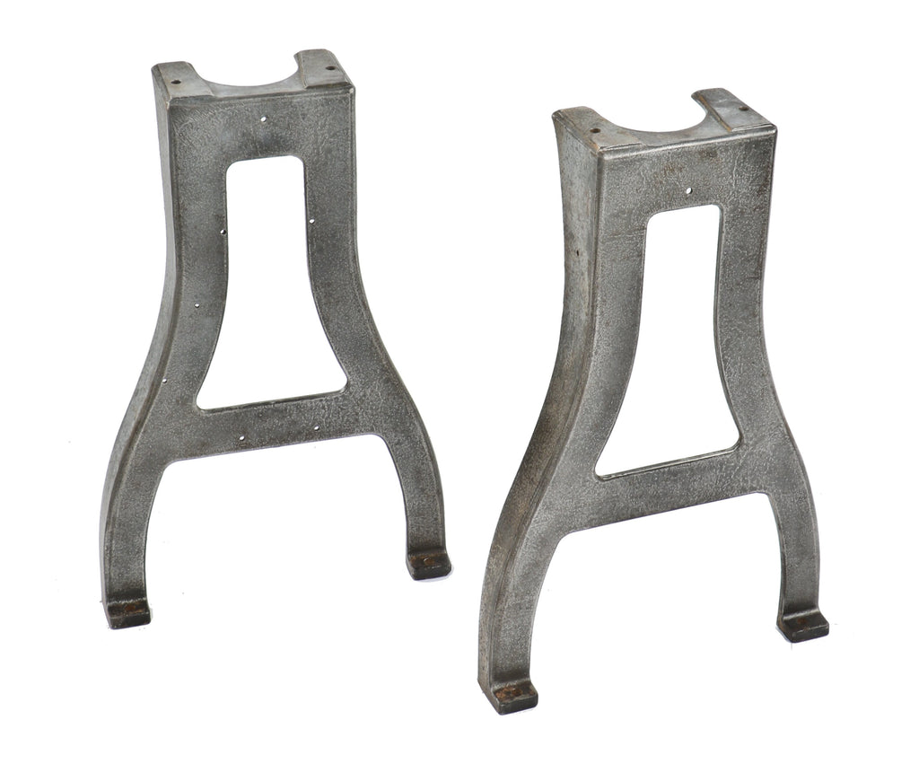 matching set of early 20th century antique american industrial curvaceous chicago factory machine shop lathe legs with a uniform brushed metal finish sealed with a clear coat lacquer