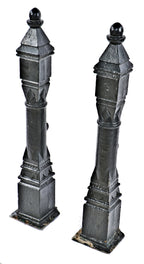 set of original 19th century salvaged chicago exterior black enameled ornamental cast iron residential newel posts with pyramidal-shaped tops containing acorn finials
