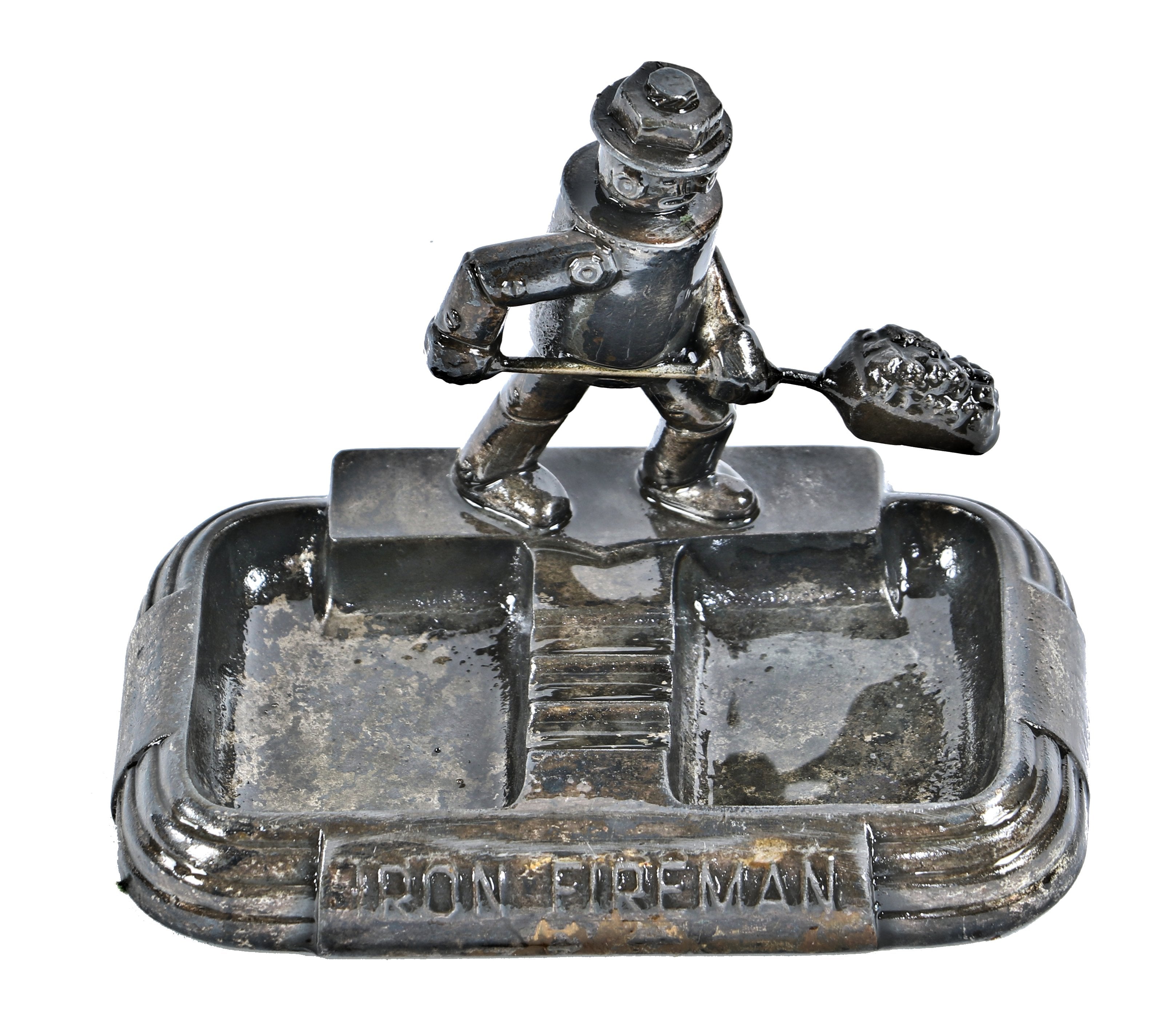 original antique american industrial figural "iron fireman" cast zinc salesman sample or company advertising with robot shoveling coal