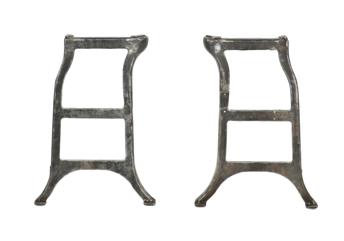 two matching all original early 20th century antique american refinished ornamental cast iron machine shop lathe bases with a mostly uniform surface finish