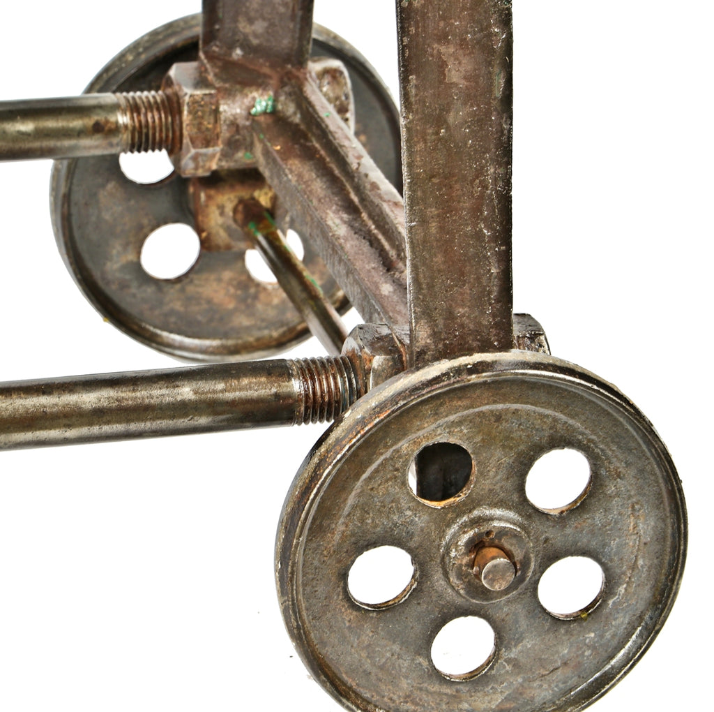 highly sought after original and fully functional repurposed boiler factory machine shop long and narrow cast iron base with intact perforated iron wheels