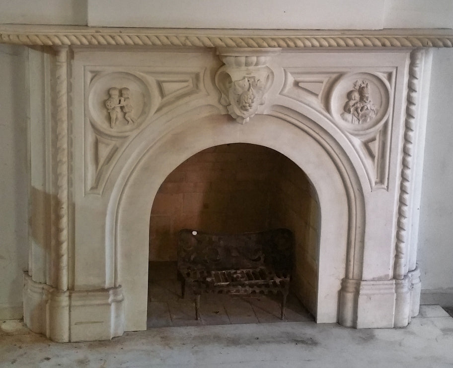 rare 1850's early american salvaged chicago carved alabama marble residential fireplace mantel with encircled bas-relief cherubs flanking oversized keystone