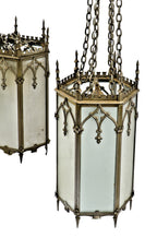 all original massive ornamental cast iron metallic silver finish gothic style interior church interior light fixtures with multifaceted glass panels