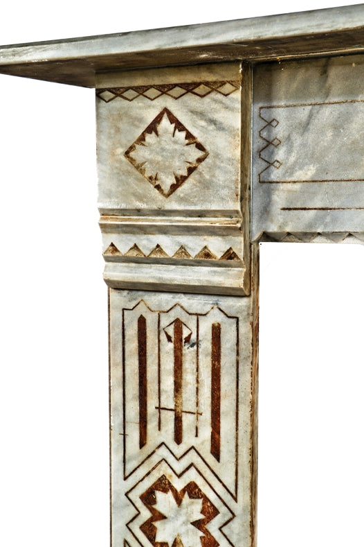 original and completely refurbished mid-1870's antique american salvaged chicago gray marble residential fireplace with lightly incised floral motifs