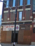 original early 1880's salvaged chicago mellos peanut candy factory building ornamental red terra cotta cornice block with unusual protruding round bullseye
