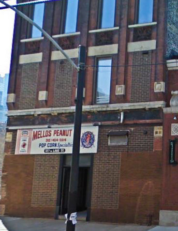 original early 1880's salvaged chicago mellos peanut candy factory building ornamental red terra cotta cornice block with unusual protruding round bullseye