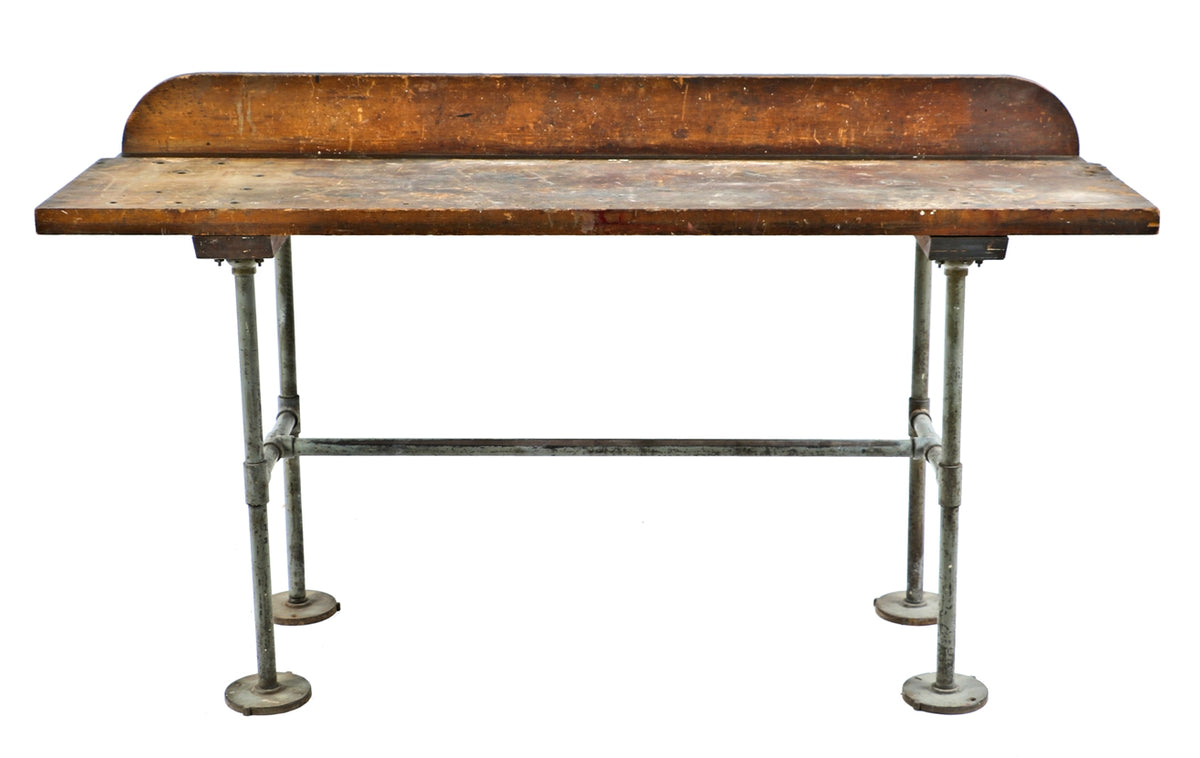 robust original c. 1940's salvaged chicago factory machine shop four-legged pine wood table top workbench with threaded steel pipe stationary base
