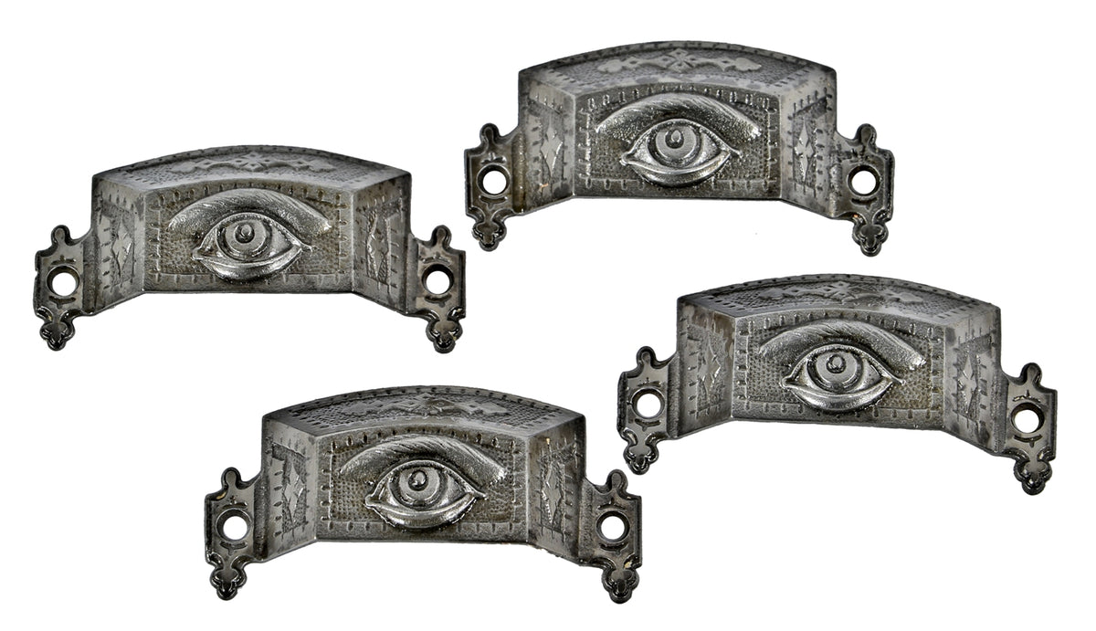 group of four all original and highly sought after original 19th century antique american ornamental cast iron "all seeing eye" bin or drawer pulls