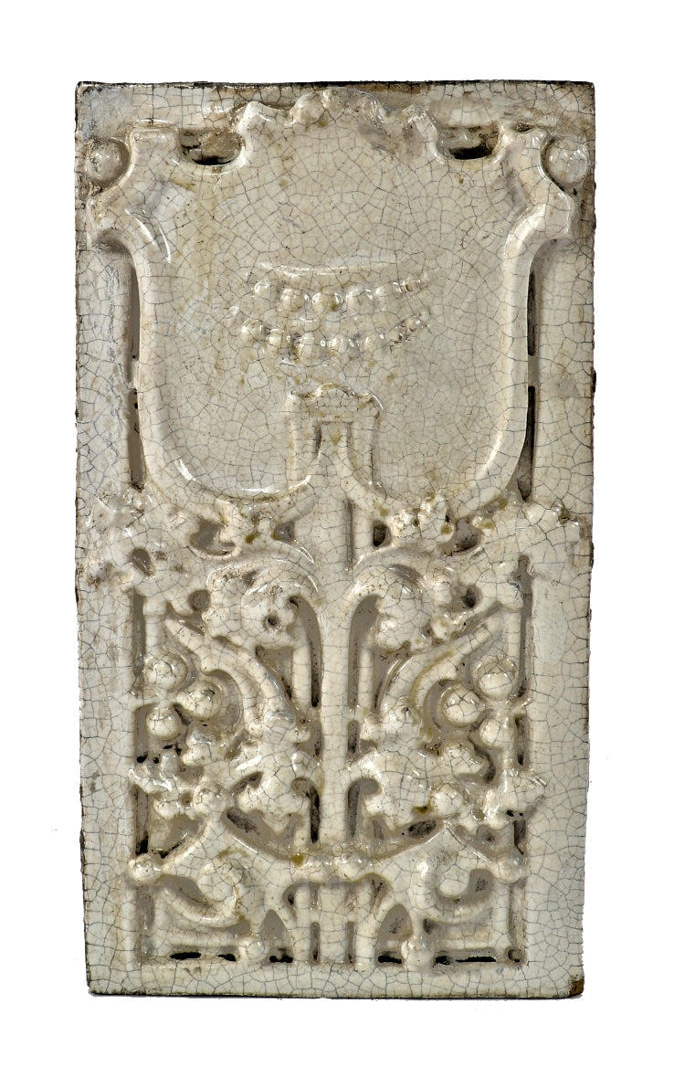 one of several matching all original and intact white glazed sullivanesque "stock" terra cotta panels salvaged from the facade of a chicago automotive garage