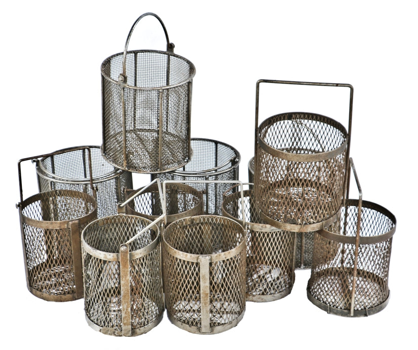two original and intact heavily reinforced vintage american industrial fixed handle mesh metal baskets with all-welded joint frames