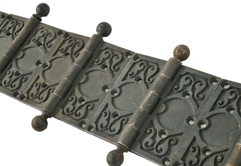 twelve matching all original and very well-maintained historic reliance building ornamental cast iron office loose pin hinges with ball finials and bower-barff finish