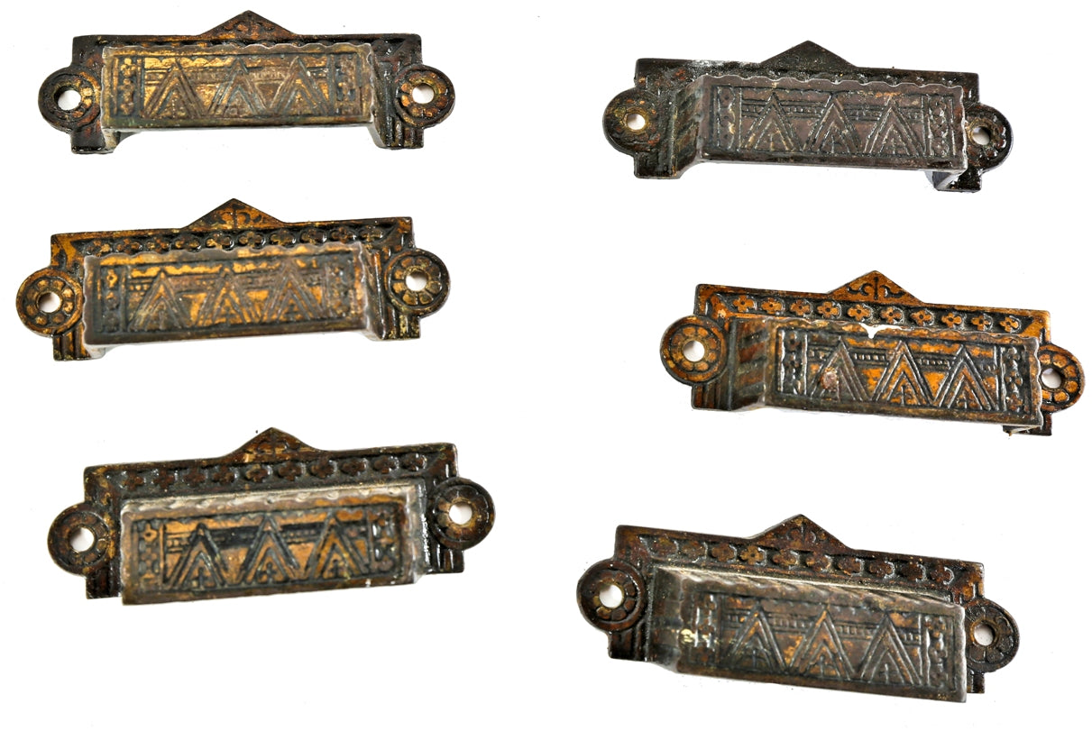 six matching original and intact brass-plated 1880's salvaged chicago "crisscross" pattern ornamental cast iron drawer pulls