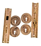 hard to find original and fully functional early 1870's cast bronze interior residential pocket door circular escutcheons with matching mortise locks