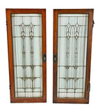 matching set of original c. 1920's salvaged chicago leaded glass interior oak wood cabinet doors with floral motifs within a rectilinear grid