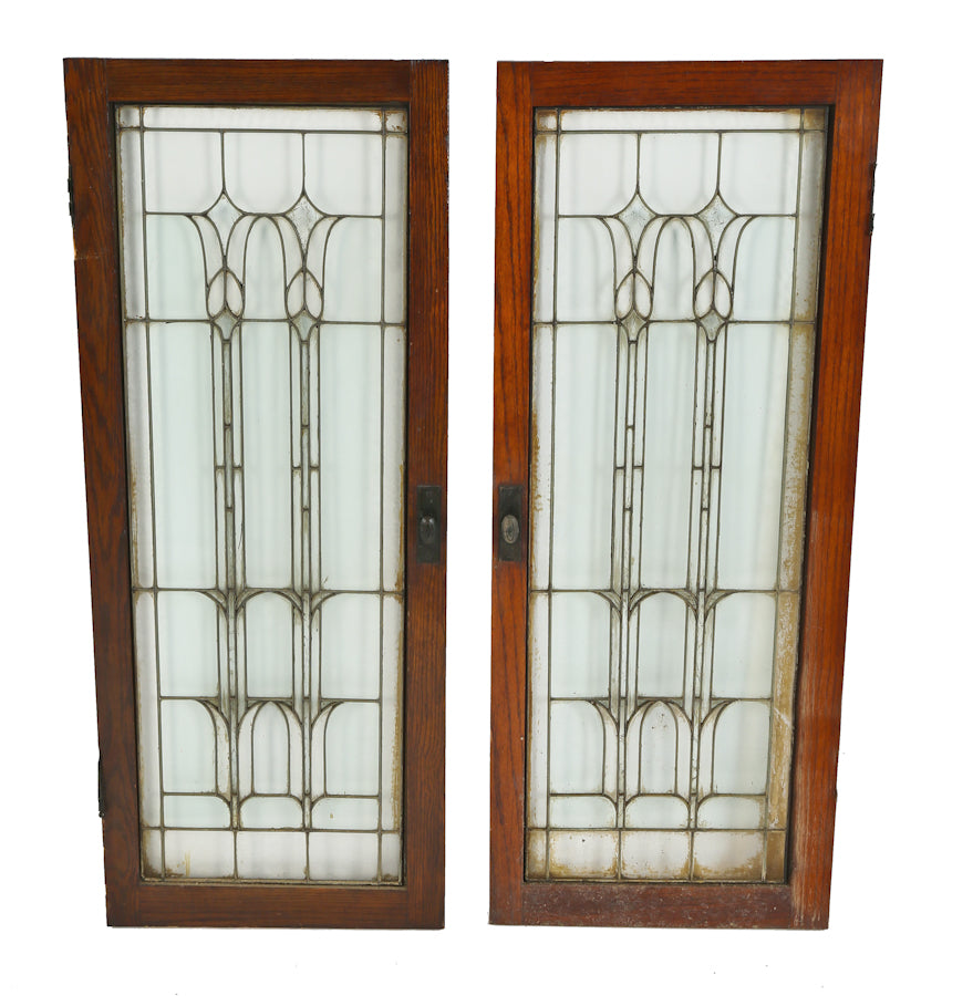 set of original c. 1920's salvaged chicago leaded glass interior oak wood cabinet doors with floral motifs within a rectilinear grid